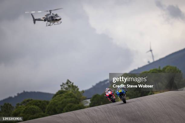 Joan Mir of Spain and Team SUZUKI ECSTAR rides in front of Johann Zarco of France and Pramac Racing filmed by the TV helicopter during the race of...