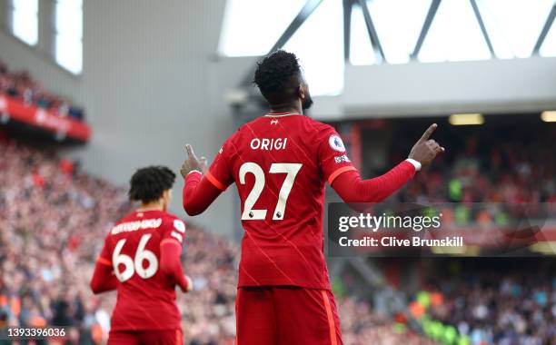 Divock Origi of Liverpool celebrates after scoring their team's second goal during the Premier League match between Liverpool and Everton at Anfield...