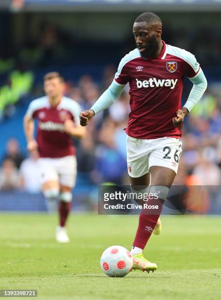 Arthur Masuaku of West Ham United controls the ball during the Premier League match between Chelsea and West Ham United at Stamford Bridge on April...