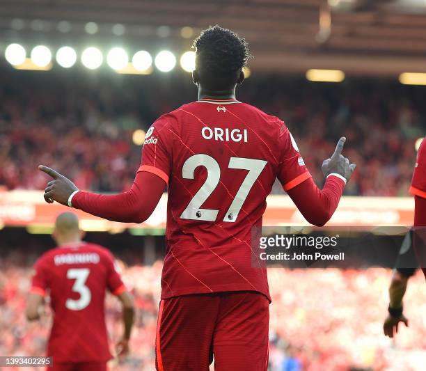 Divock Origi of Liverpool celebrates scoring the second goal during the Premier League match between Liverpool and Everton at Anfield on April 24,...