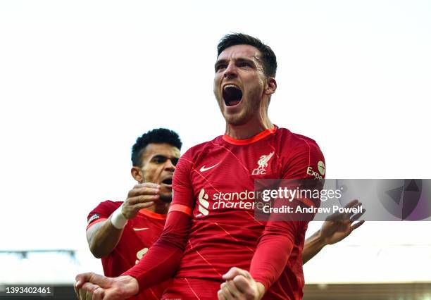 Andy Robertson of Liverpool celebrates after scoring the opening goal during the Premier League match between Liverpool and Everton at Anfield on...