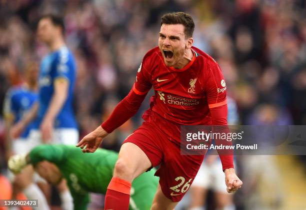 Andy Robertson of Liverpool celebrates after scoring the opening goal during the Premier League match between Liverpool and Everton at Anfield on...