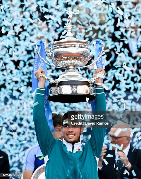 Carlos Alcaraz of Spain celebrates with the trophy after winning their match against Pablo Carreño Busta of Spain during Day seven of Barcelona Open...