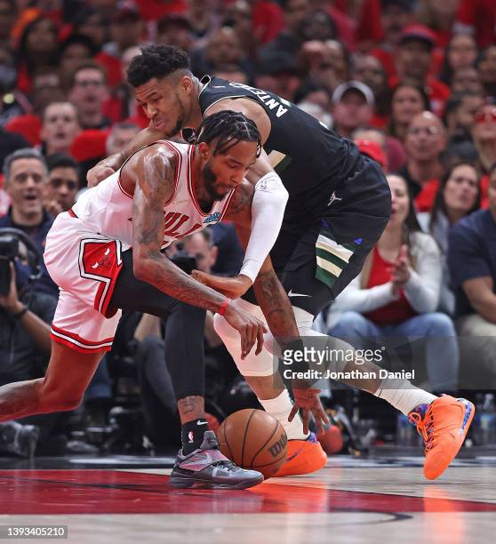 Derrick Jones Jr. #5 of the Chicago Bulls strips the ball from Giannis Antetokounmpo of the Milwaukee Bucks during Game Four of the Eastern...