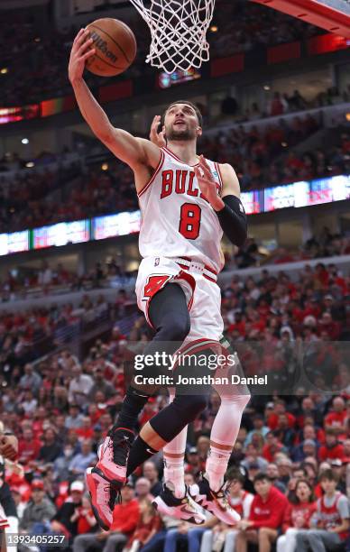 Zach LaVine of the Chicago Bulls drives to the basket past Grayson Allen of the Milwaukee Bucks during Game Four of the Eastern Conference First...