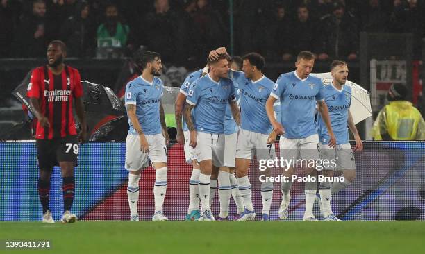 Ciro Immobile of SS Lazio celebrates with teammates after scoring their team's first goal during the Serie A match between SS Lazio and AC Milan at...