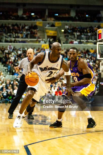 Michael Jordan of the Washington Wizards and Kobe Bryant of the L.A.Lakers in action during a game at The MCI Center on November 08, 2002 in...