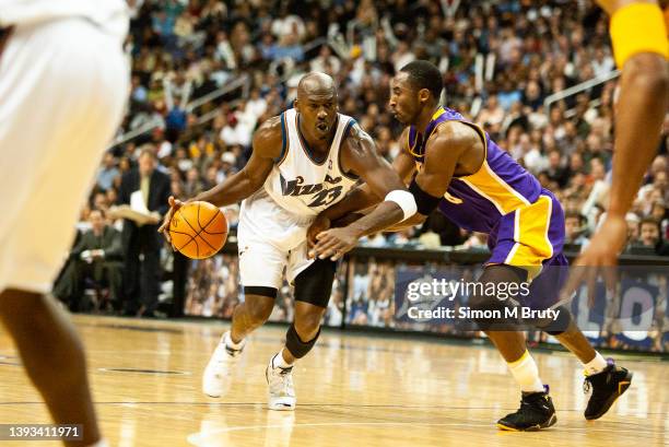 Michael Jordan of the Washington Wizards and Kobe Bryant of the L.A.Lakers in action during a game at The MCI Center on November 08, 2002 in...