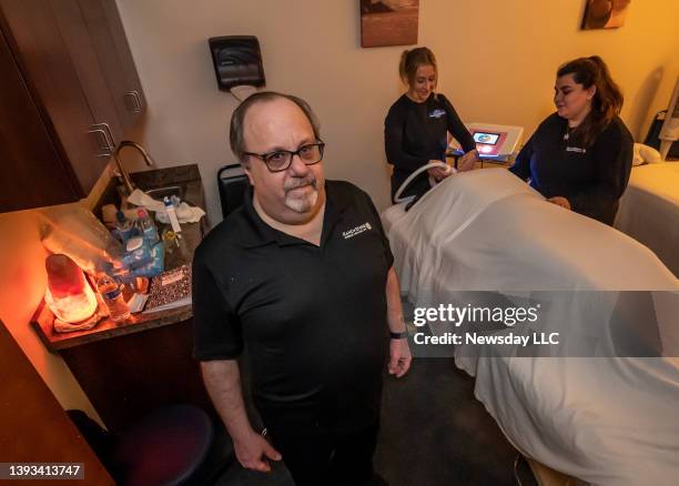 Alan Bernstein, owner of Hand & Stone Massage and Facial Spa in Hewlett, in one of the massaging rooms where training for Cryoskin is taking place on...