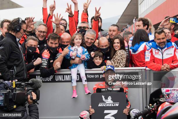 Aleix Espargaro of Spain and Aprilia Racing celebrates with team and family after securing third place during the MotoGp race during the MotoGP Of...