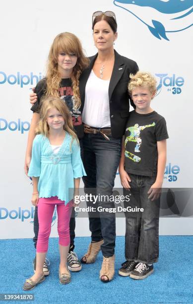 Marcia Gay Harden, daughter Eulala Scheel, twins Julitta Scheel and Hudson Scheel arrive at the World Premiere of "Dolphin Tale" at the Village...