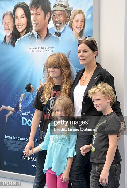 Marcia Gay Harden, daughter Eulala Scheel, twins Julitta Scheel and Hudson Scheel arrive at the World Premiere of "Dolphin Tale" at the Village...