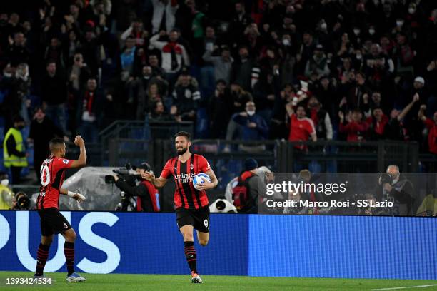 Olivier Giroud of AC Milan celebrates a first goal during the Serie A match between SS Lazio and AC Milan at Stadio Olimpico on April 24, 2022 in...