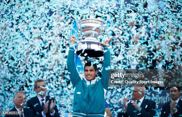 Carlos Alcaraz of Spain celebrates with the winners trophy after defeating Pablo Carreno of Spain in the final during day seven of the Barcelona Open...