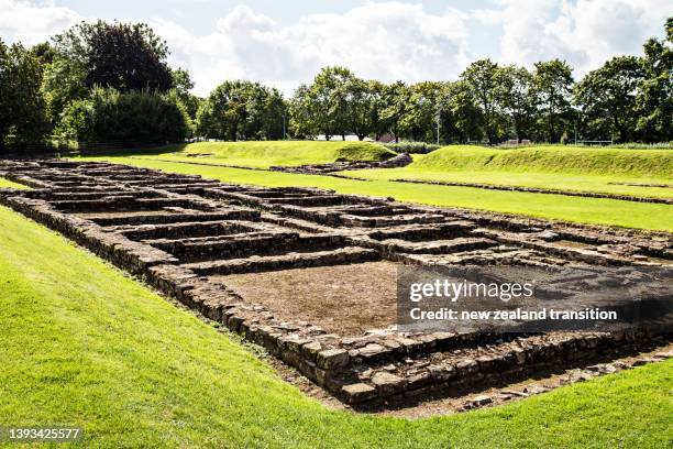 ruins of roman barracks at caerleon against blue sky, uk - newport wales stock pictures, royalty-free photos & images