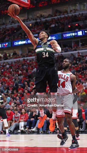 Giannis Antetokounmpo of the Milwaukee Bucks puts up a shot past Patrick Williams of the Chicago Bulls during Game Four of the Eastern Conference...