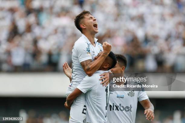 Vinicius Zanocelo of Santos celebrates with teammates after scoring the second goal of his team during the match between Santos and América MG as...