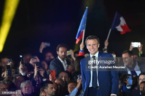 France's centrist incumbent president Emmanuel Macron adresses voters in front of the Eiffel Tower after beating his far-right rival Marine Le Pen...