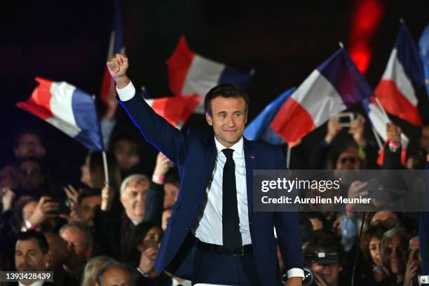 France's centrist incumbent president Emmanuel Macron adresses voters in front of the Eiffel Tower after beating his far-right rival Marine Le Pen...