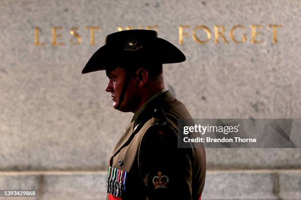 Defence person stands next to the Cenotaph during the Sydney Dawn Service on April 25, 2022 in Sydney, Australia. Anzac day is a national holiday in...