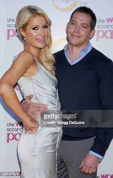 Paris Hilton and Cy Waits arrive at "The World According to Paris" Premiere Party at the Tropicana Bar at the Hollywood Roosevelt Hotel on May 17,...