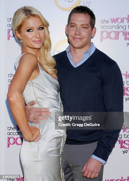 Paris Hilton and Cy Waits arrive at "The World According to Paris" Premiere Party at the Tropicana Bar at the Hollywood Roosevelt Hotel on May 17,...