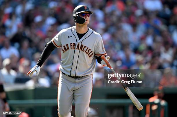 Joc Pederson of the San Francisco Giants flips his bat after hitting a home run in the seventh inning against the Washington Nationals at Nationals...