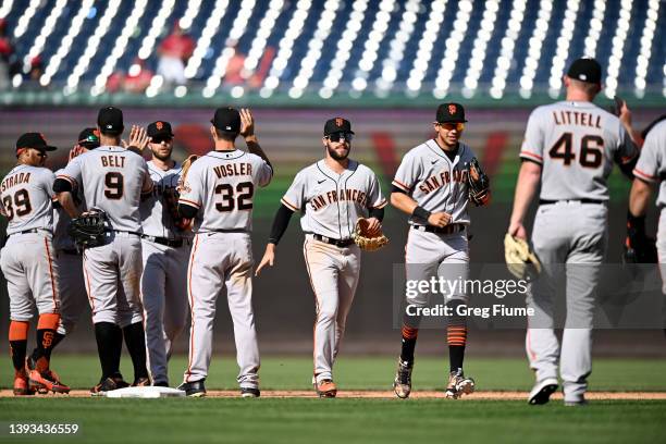 The San Francisco Giants celebrate after a 12-3 victory against the Washington Nationals at Nationals Park on April 24, 2022 in Washington, DC.