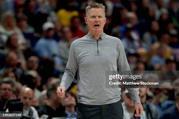 Head coach Steve Kerr of the Golden State Warriors shouts to his team as they play against the Denver Nuggets in the first quarter during Game Four...