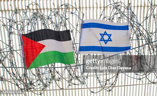 Palestine and Israel flag on barbed wire Palestine and Israel flag on barbed wire