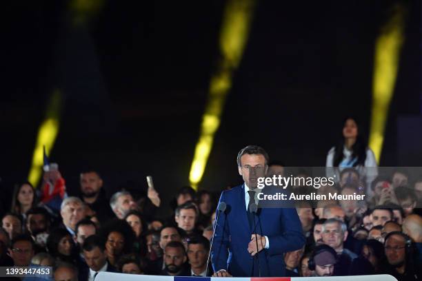 France's centrist incumbent president Emmanuel Macron adresses voters in front of the Eiffel Tower after beating his far-right rival Marine Le Pen...