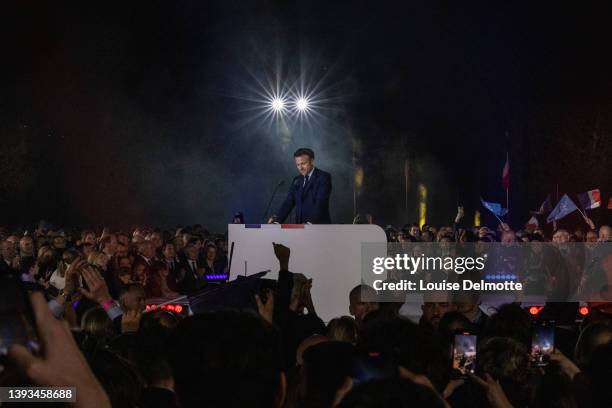 Emmanuel Macron addresses supporters after defeating Marine Le Pen for a second five-year term as president in the French presidential election on...