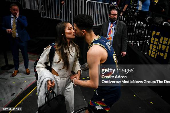 Austin Rivers Denver Austin Rivers of the Denver Nuggets kisses his wife, Audreyana after ...