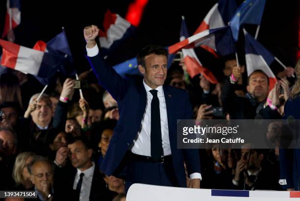 French President Emmanuel Macron celebrates his re-election at the Champ de Mars near the Eiffel Tower on April 24, 2022 in Paris, France. France's...