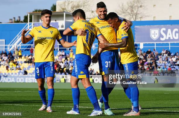 Andre Franco of GD Estoril Praia celebrates with teammates after score a goal during the Liga Bwin match between GD Estoril Praia and Belenenses SAD...
