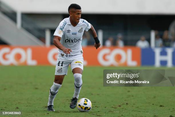 Angelo of Santos runs with the ball during the match between Santos and América MG as part of Brasileirao Series A 2022 at Urbano Caldeira Stadium on...