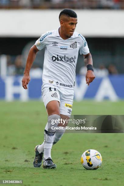 Angelo of Santos runs with the ball during the match between Santos and América MG as part of Brasileirao Series A 2022 at Urbano Caldeira Stadium on...