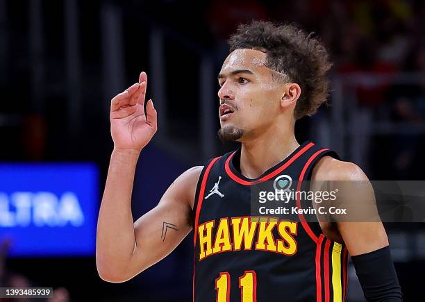 Trae Young of the Atlanta Hawks reacts after hitting a three-point basket against the Miami Heat during the second half in Game Four of the Eastern...