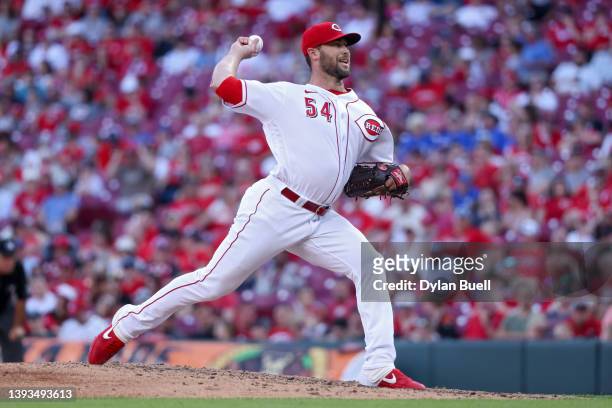 Hunter Strickland of the Cincinnati Reds pitches in the eighth inning against the St. Louis Cardinals at Great American Ball Park on April 23, 2022...