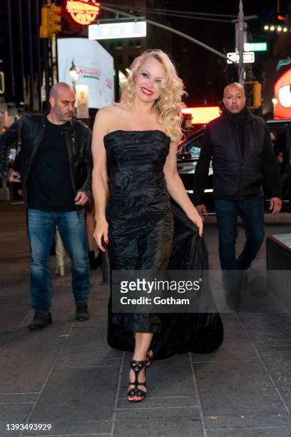 Pamela Anderson visits the billboard for her Broadway musical “Chicago” for the first time in Times Square on April 24, 2022 in New York City.