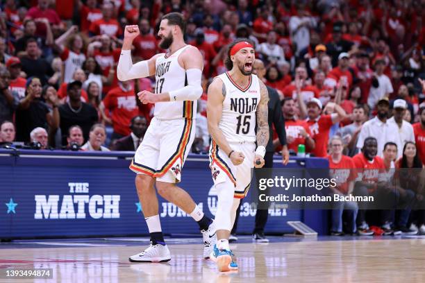 Jose Alvarado and Jonas Valanciunas of the New Orleans Pelicans react during the second half of Game Four of the Western Conference First Round...