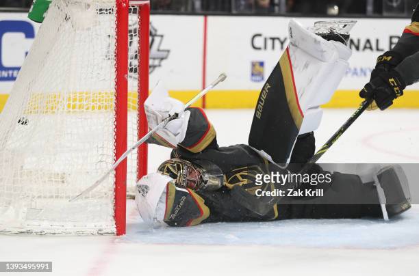 Logan Thompson of the Vegas Golden Knights allows a goal during the third period of a game against the San Jose Sharks at T-Mobile Arena on April 24,...