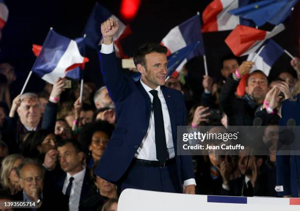 French President Emmanuel Macron celebrates his re-election at the Champ de Mars near the Eiffel Tower on April 24, 2022 in Paris, France. France's...