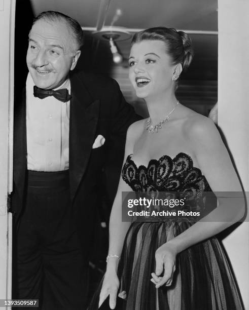 American actor Louis Calhern and Irish-British actress Angela Lansbury on the set of their film 'Remains to Be Seen,' in Los Angeles, California,...