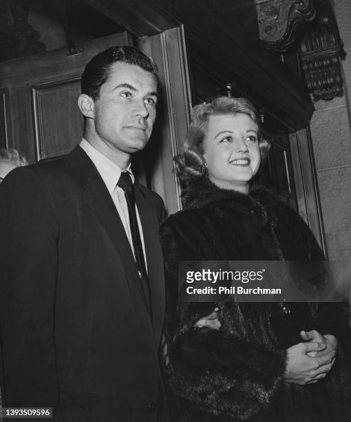 British actor and producer Peter Shaw and his wife, Irish-British actress Angela Lansbury attend an event, circa 1950.