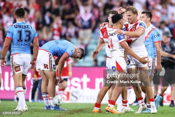 Talatau Amone and Jack De Belin of the Dragons celebrate victory during the round seven NRL match between the St George Illawarra Dragons and the...