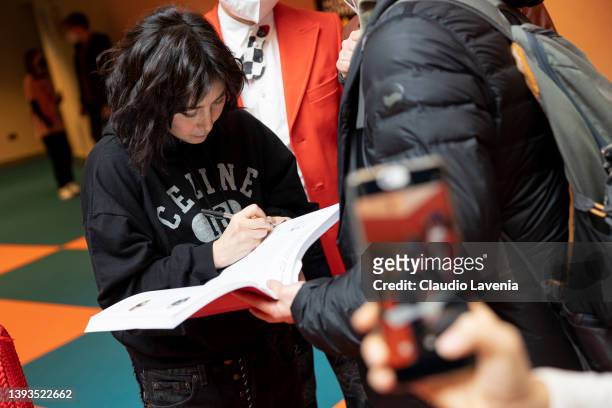 Josie Ho signs autographs during the 24th annual Far East Film Festival to premiere "Finding Bliss: Fire and Ice" on April 23, 2022 in Udine, Italy.