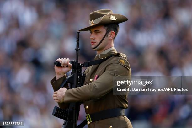 Soldier is seen during the ANZAC service before the round six AFL match between the Essendon Bombers and the Collingwood Magpies at Melbourne Cricket...