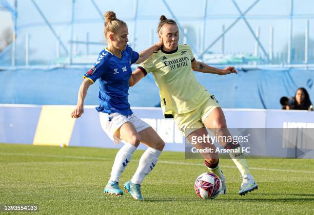 Caitlin Foord of Arsenal is challenged by Leonie Maier of Everton during the Barclays FA Women's Super League match between Everton Women and Arsenal...