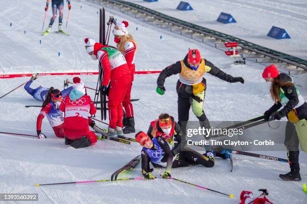 February 12: The ROC team of Veronika Stepanova, Yulia Stupak, Tatiana Sorina and Natalia Nepryaeva celebrate after winning the gold medal as Sofie...